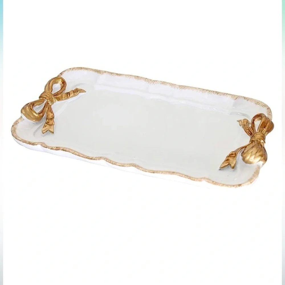 Jewelry tray with gold bows coquette style